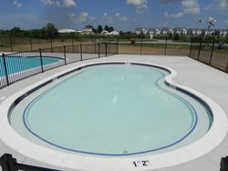 <div class='closebutton' onclick='return hs.close(this)' title='Close'></div><div class='firstH'><img src='images/logo-white-small.png'></div><h1>Custom Concrete</h1><p>Custom Concrete #040 by Pool Tron</p><div class='getSocial'><h1>Share</h1><p class='photoBy'>Photo by Pool Tron</p><iframe src='http://www.facebook.com/plugins/like.php?href=http%3A%2F%2Fpooltron.com%2Fimages%2Fgalleries%2Fcustom-concrete%2Fwm%2Fcustom-concrete-pool-by-pool-tron-040.jpg&send=false&layout=button_count&width=100&show_faces=false&action=like&colorscheme=light&font&height=21' scrolling='no' frameborder='0' style='border:none; overflow:hidden; width:100px; height:21px;' allowTransparency='true'></iframe><br><a href='http://pinterest.com/pin/create/button/?url=http%3A%2F%2Fwww.pooltron.com&media=http%3A%2F%2Fwww.pooltron.com%2Fimages%2Fgalleries%2Fcustom-concrete%2Fwm%2Fcustom-concrete-pool-by-pool-tron-040.jpg&description=Pools' data-pin-do='buttonPin' data-pin-config=\'above\'><img src='http://assets.pinterest.com/images/pidgets/pin_it_button.png' /></a><br></div>
